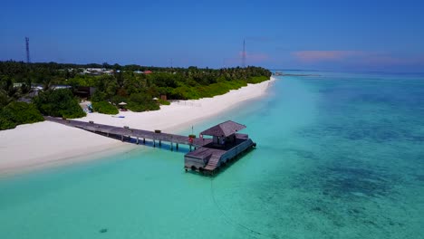Aerial-drone-side-drift-over-view-of-Maldives-resort-island