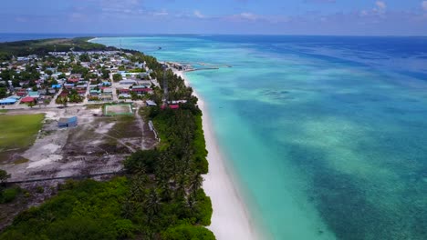 Hanimaadhoo-island-in-the-Maldives-Haa-Dhaalu-Atoll,-high-aerial-view-4k