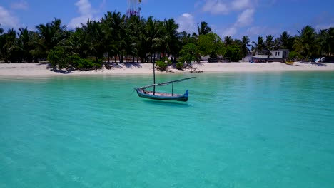 Empty-wobbling-fishing-boat-on-coast-of-Maldives-island