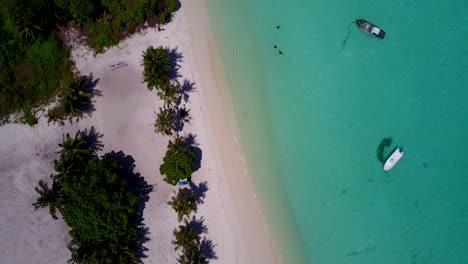 Aerial-shot-straight-from-above-drifting-along-tropical-beach-of-Thailand