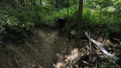 Wooded-area-with-drainage-tunnel---zoom-out