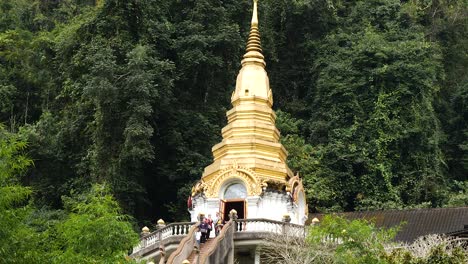 Golden-Temple-Pagoda-in-the-jungle-Wat-Tham-Pha-Plong,-Chiang-Dao,-Thailand