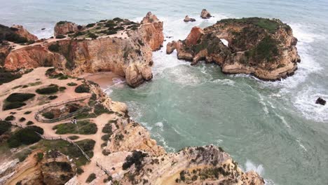 flying-over-unique-rock-formations-and-sandy-beaches-of-Ponta-de-Piedade