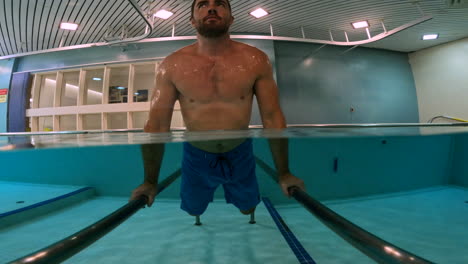 Man-in-pool-doing-physical-therapy