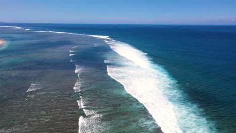 Aerial-view-over-coral-reefs-and-big-waves-in-the-coast-of-Reunion-Island