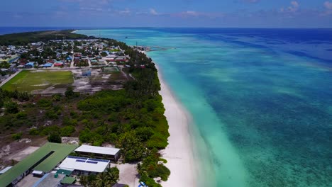 Scenic-aerial-drone-fly-over-shot-above-Maldives-tropical-island