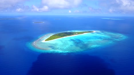Mysterious-deserted-island-in-the-tropics,-aerial-view-of-beautiful-environment