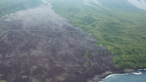 High-aerial-view-over-the-destructive-dried-lava-flow-from-a-volcanic-eruption-on-Reunion-Island