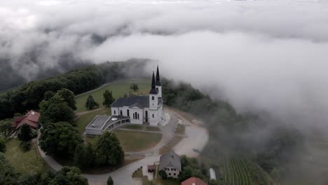 Beautiful-view-of-the-church-on-top-of-the-hill-in-the-fog