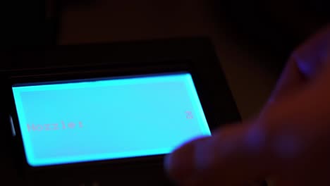 Increasing-Nozzle-temperature-of-3D-printer-with-LCD-display-lighting-blue-in-the-darkness
