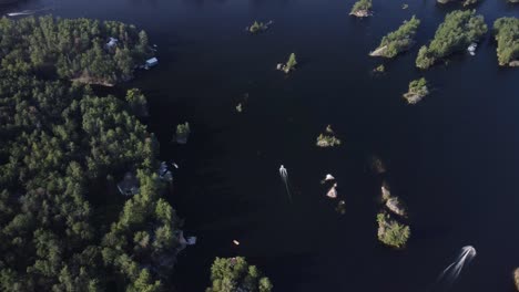Top-down-drone-view-of-a-remote-cottage-lake