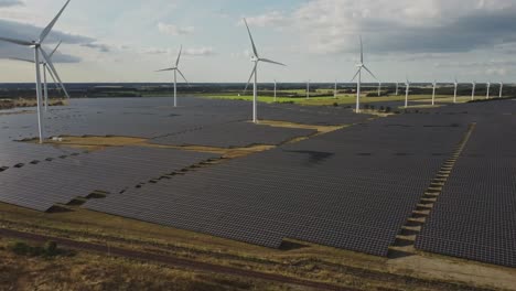 Solar-Panels-And-Wind-Turbines-in-The-Countryside-Producing-Clean-Energy-In-Vemb-and-Holstebro,-Denmark