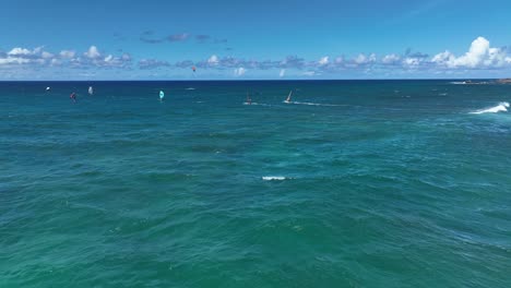 Water-sports-navigating-around-each-other-and-crossing-paths-at-Hookipa-Beach