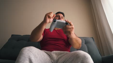 Young-man-losing-while-playing-video-games-in-slow-motion