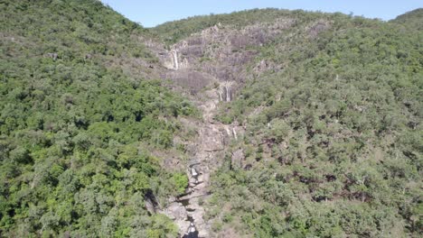 Jourama-Falls-During-Summer-In-Paluma-Range-National-Park,-North-Queensland,-Australia---aerial-shot