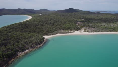 Scenic-Great-Keppel-Island-With-Turquoise-Ocean-And-Lush-Vegetation-In-Queensland,-Australia---aerial-drone-shot