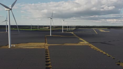 Scenery-Of-Wind-Farm-Turbines-And-Solar-Cell-Plant-On-Rural-Landscape-Near-Holstebro,-Denmark