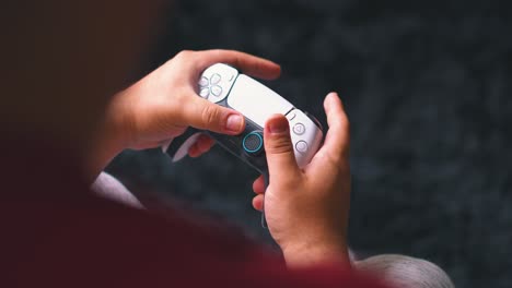 Close-up-of-hands-playing-video-game
