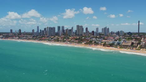 Flying-towards-Natal-Skyline,-Beautiful-beach-with-Turquoise-water,-Brazil