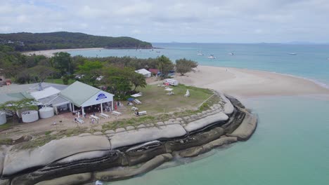 Aerial-View-Of-Great-Keppel-Island-Holiday-Village---Beachfront-Hotel-In-Woppaburra,-QLD,-Australia