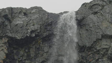 Water-falls-from-top-of-the-rock-in-slow-motion