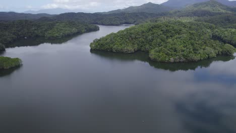 Tropical-Rainforests-Surrounding-Copperlode-Dam-In-Cairns-Region,-Queensland,-Australia---aerial-shot