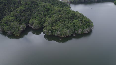Drone-Flight-Over-Copperlode-Falls-Dam-Or-Lake-Morris-In-Cairns-Region,-Queensland,-Australia
