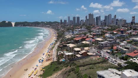 Aerial-view-of-beautiful-Ponta-negra-coastline,-Scenic-beach-and-Skyline,-Natal