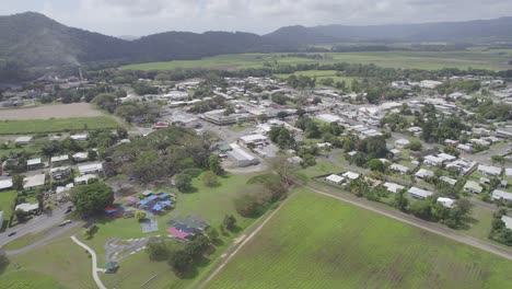 Agricultural-Fields-And-Houses-In-The-Town-Of-Mossman,-Shire-of-Douglas,-Queensland,-Australia---aerial-shot