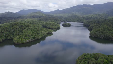 Reflection-Of-Cloudy-Sky-On-The-Calm-Waters-Of-Lake-Morris-In-North-Queensland,-Australia---aerial-drone-shot