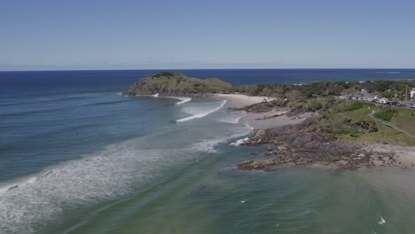 Foamy-Waves-Splashing-On-Sandy-Shore-At-Cabarita-Beach-In-NSW,-Australia---aerial-drone-shot