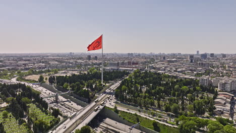 Istanbul-Turkey-Aerial-v11-cinematic-fly-around-turkish-flag-waving-high-at-the-european-side-neighborhood-capturing-downtown-cityscape-and-busy-highway-traffics---Shot-with-Mavic-3-Cine---July-2022
