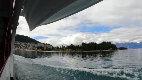 View-Of-Queenstown-Center-From-Cruising-Earnslaw-Ship-On-Lake-Wakatipu-In-Queenstown,-New-Zealand