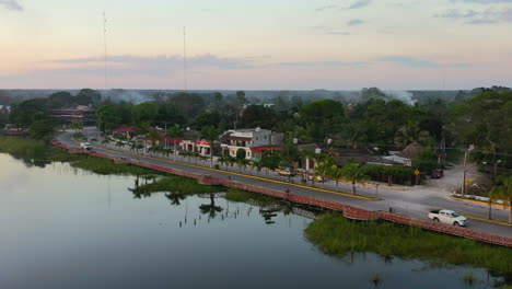 aerial-landscape-of-lake-beside-road-near-Coba-town-at-golden-hour-sunset-in-Mexico