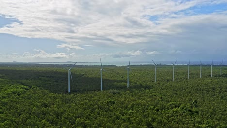 Turning-wind-turbines-in-pristine-environment---La-Plaine-des-Roches,-aerial