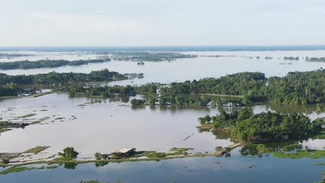Aerial-View-Of-Floodwaters-Covering-Land-In-Rural-Sylhet,-Bangladesh