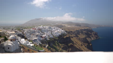 Panoramic-view-of-Thera-in-Santorini,-Greece-on-a-sunny-day