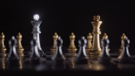 Cinematic-shot-of-two-kings-facing-off-on-a-chess-board-surrounded-by-pawns