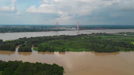 Highway-Suspension-Bridge-in-Can-Tho-Mekong-River-Delta-in-Vietnam,-Flooding-Rainy-Season-in-Can-Tho