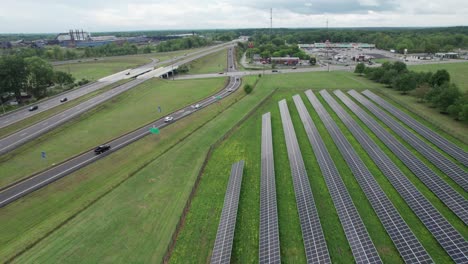 Overtake-Shot-Of-Solar-Panels-Roadside-On-Green-Field-,-Ohio-United-States
