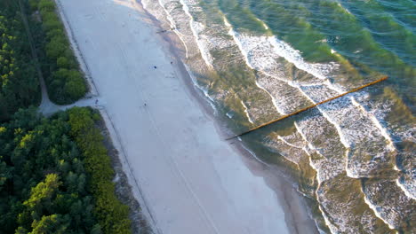 Aerial-view-of-Hel-Peninsula-white-sand-beach-coastline-by-Baltic-Sea-in-Wladyslawowo,-Poland