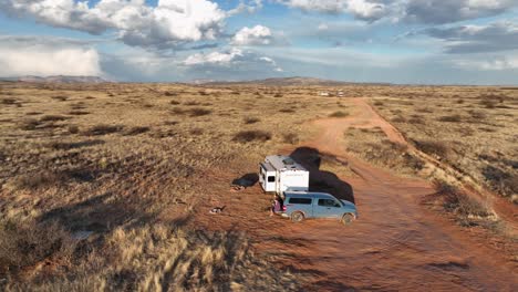 Circling-Over-Luxury-Camper-Van-Parked-Amidst-Wilderness-In-Sedona,-Arizona