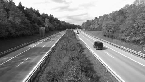 Driving-cars-at-a-Autobahn-in-black-and-white-without-colors