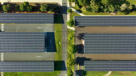 Birds-Eye-Flyover-Carpark-Covered-With-Solar-Panels-Grid,-4K-Aerial-Drone