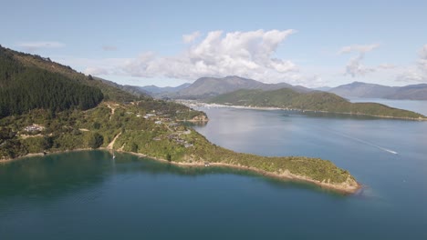 Speed-boat-driving-through-the-Marlborough-sounds-and-past-Karaka-Point