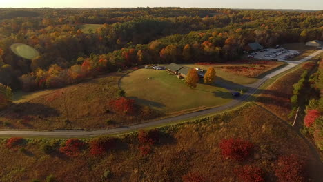 Cinematic-drone-shot-of-an-autumn-forest-in-Hocking-Hills-in-Logan,-Ohio
