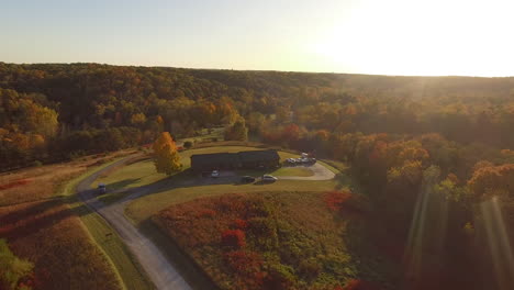 Cinematic-drone-shot-of-an-autumn-forest-in-Hocking-Hills-in-Logan,-Ohio