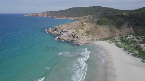 Drone-Shot-Of-Wreck-Bay-With-Scenic-Beach-In-Great-Keppel-Island,-Queensland,-Australia