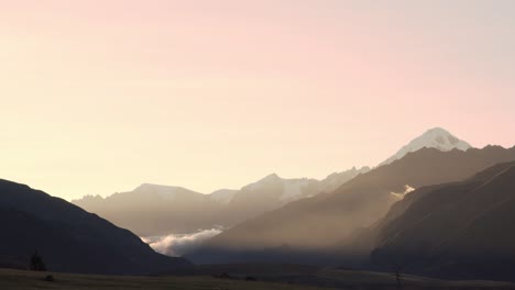 Astounding-first-rays-of-light-early-morning-view-of-the-valley-and-mountains-in-the-Huaraz-peru-with-amazing-pink-sky-and