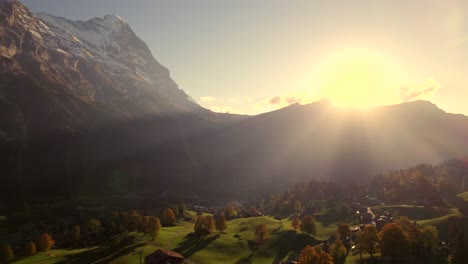 aerial-drone-footage-pushing-in-over-Bodmi-Area-in-Grindelwald-with-stunning-view-of-Eiger-North-Face,-Switzerland